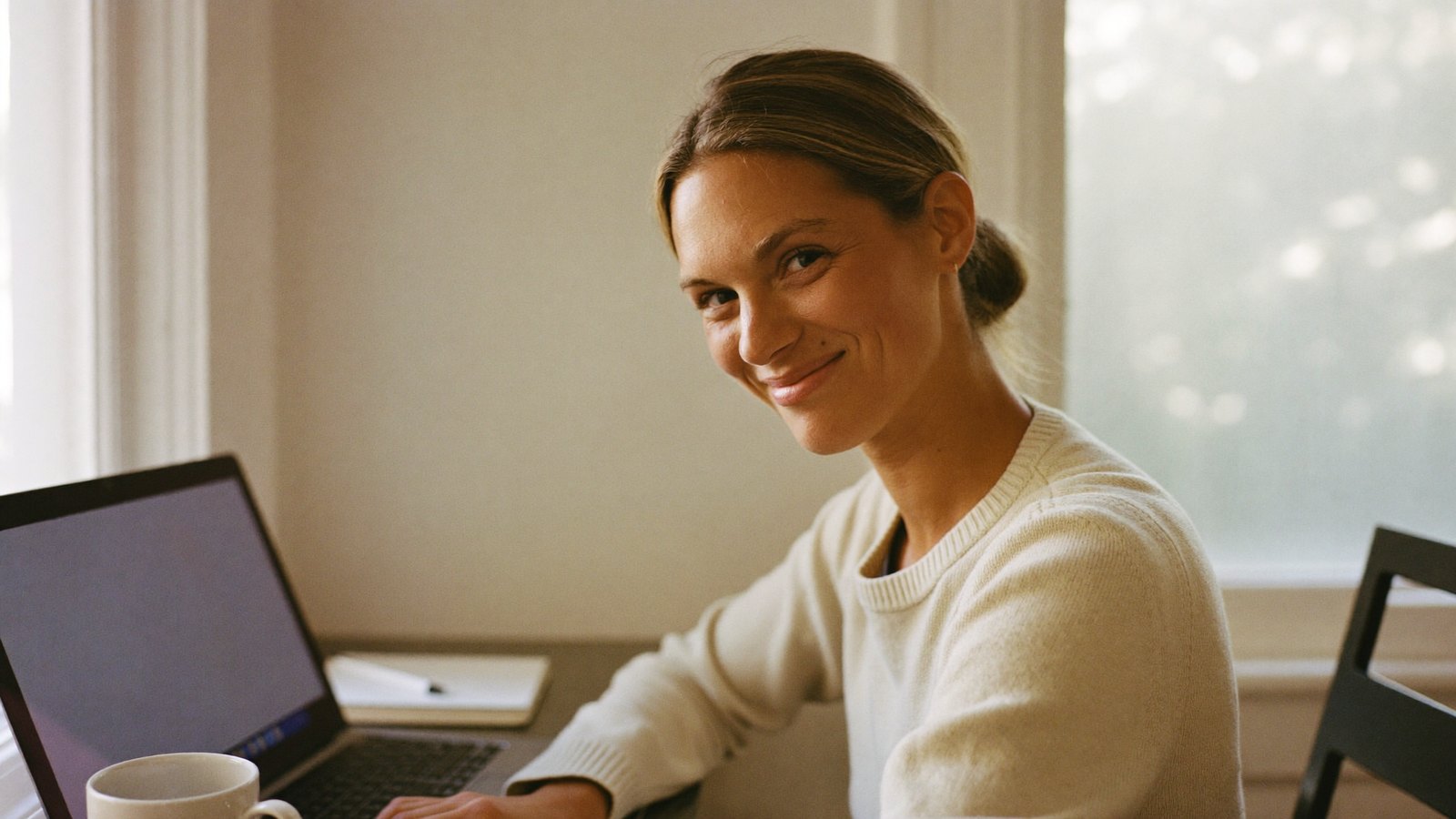 A freelancer working at a home desk